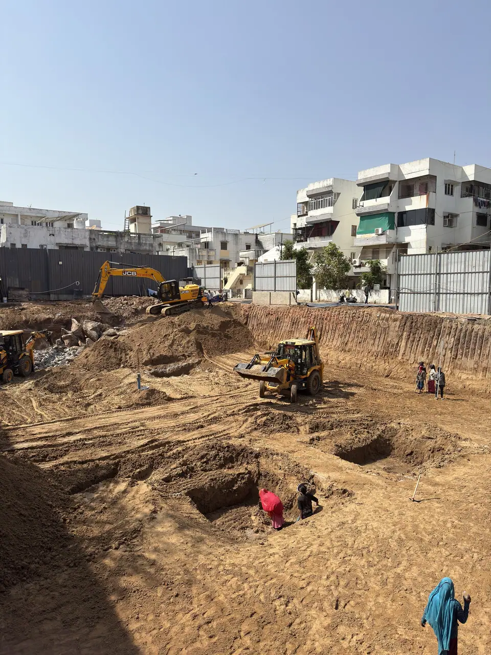 Excavators clearing the Shreeji Elora site